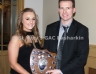 Club Chairman Michael Hardy presents the McKillop Family Shield for most successful Juvenile team to Noeleen O’Kane who accepts on behalf of the Under 16 Camogie Team and management.